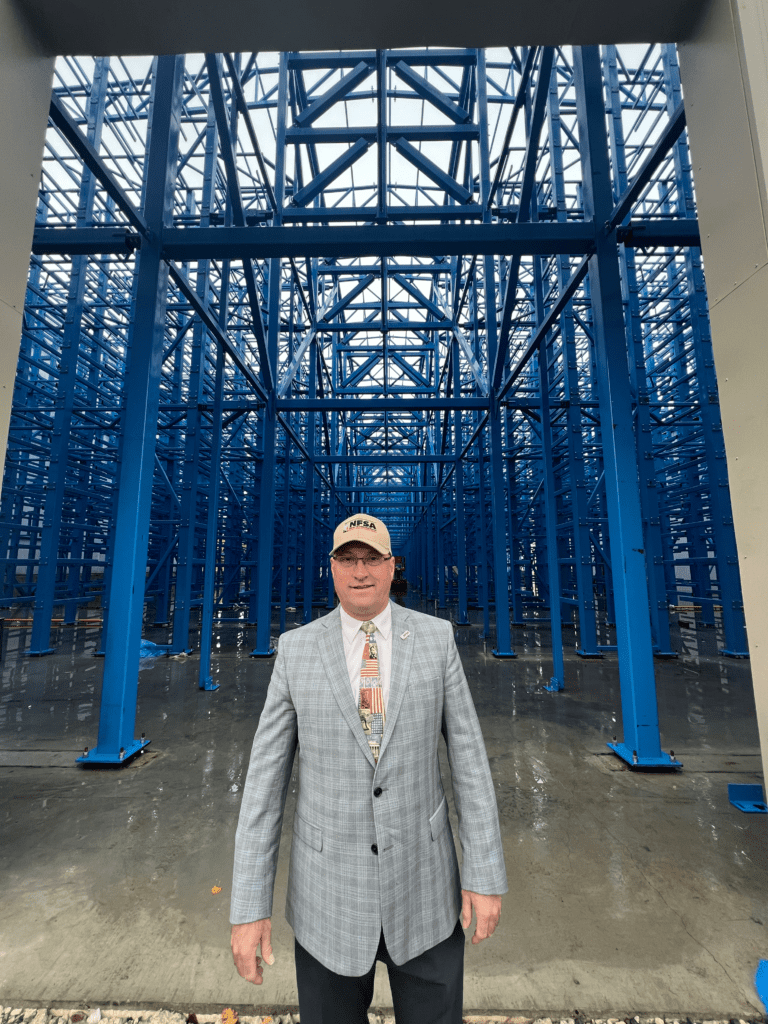 President Shane Ray in front of Wheatland's new facility in OH.